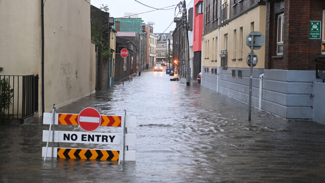 <p> Flood waters on Rutland Street, Cork City. Picture: Larry Cummins</p>