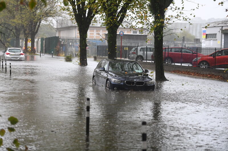 Cars abandoned in flood waters on Centre Park Road after Storm Babet. Picture: Larry Cummins Cars abandoned in flood waters on Centre Park Road after Storm Babet. Picture: Larry Cummins