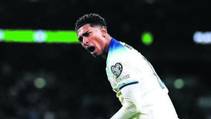 <p>England’s Jude Bellingham celebrates after setting up Marcus Rashford for their second goal against Italy. Pic: John Walton/PA</p>