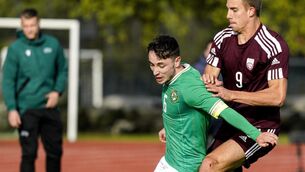 <p>MATTER OF TIME: Joe Hodge of Republic of Ireland in action against Andris Deklavs of Latvia during the UEFA European U21 Championship qualifying group A match. Pic: Roman Koksarov/Sportsfile</p>