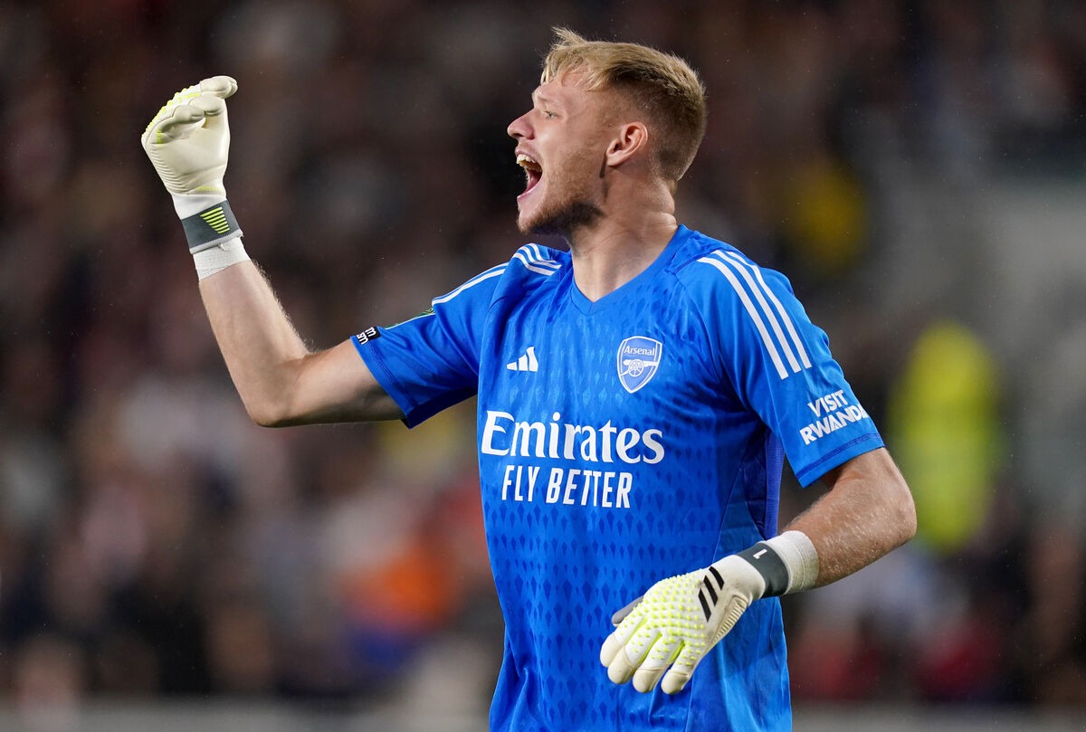 Arsenal goalkeeper Aaron Ramsdale gestures towards his team mates during the Carabao Cup third round match at the Gtech Community Stadium, London. Picture date: Wednesday September 27, 2023.