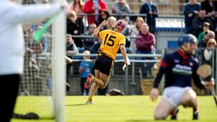<p>UP AND RUNNING: Michael O'Loughlin of Clonlara celebrates scoring the first goal of the Ckare SHC final. Pic: INPHO/Natasha Barton</p>