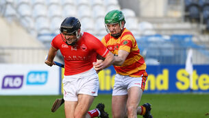<p> STALEMATE: Blarney's Padraig Power is fouled by Newcestown's Micheál McSweeney during the Co-Op Superstores Senior AHC final at Pairc Ui Chaoimh. Picture; Eddie O'Hare</p>