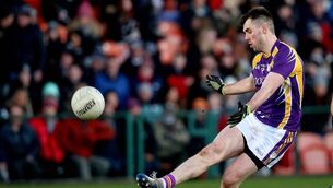 <p>ANOTHER FINAL WIN: Stephen McGullion captained Derrygonnelly to another county final win. Pic: ©INPHO/Bryan Keane</p>