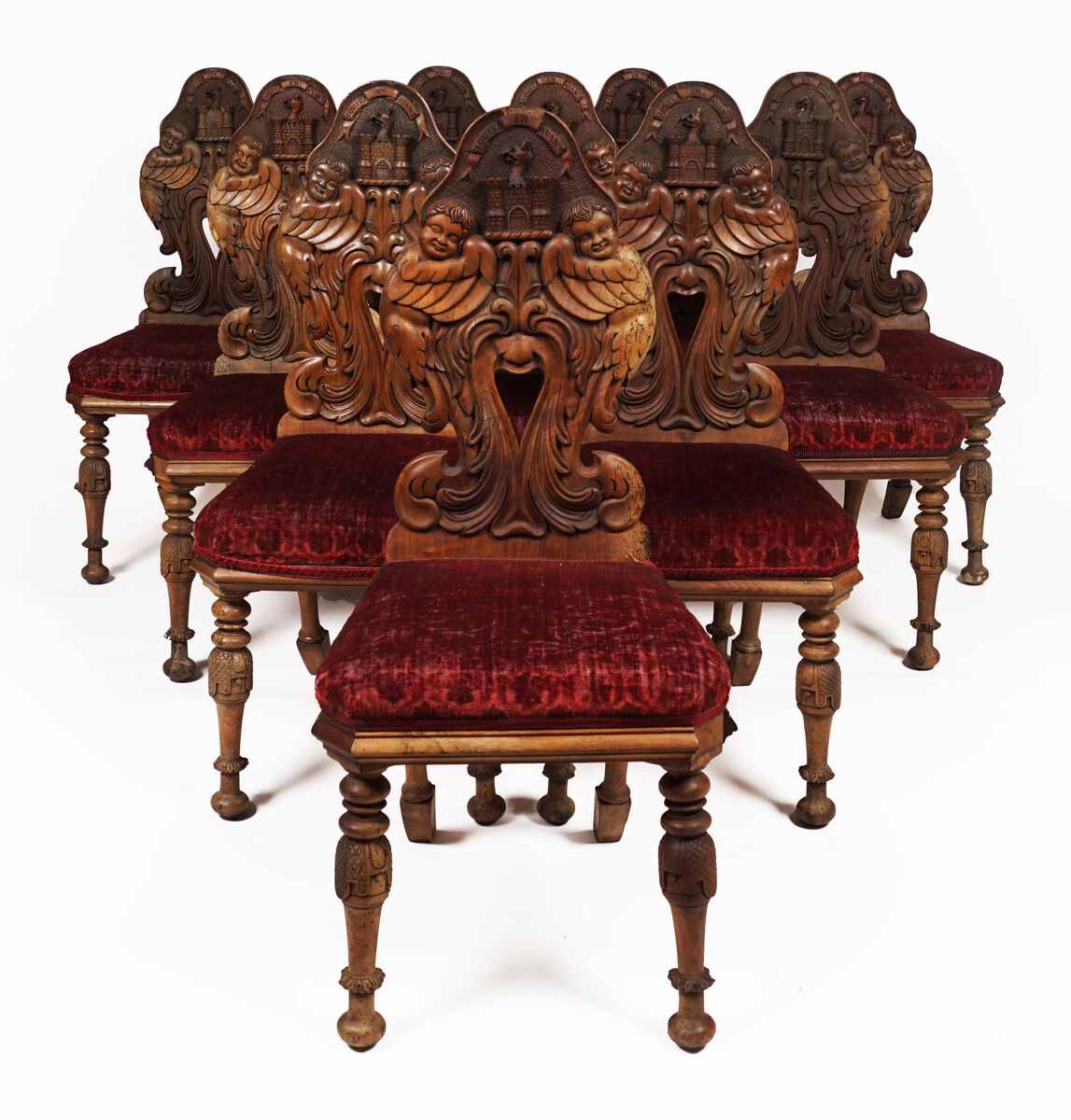 A set of ten Fota House armorial side chairs at Sheppards.