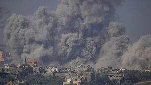 <p>Smoke rises following an Israeli airstrike in the Gaza Strip, as seen from southern Israel.</p>