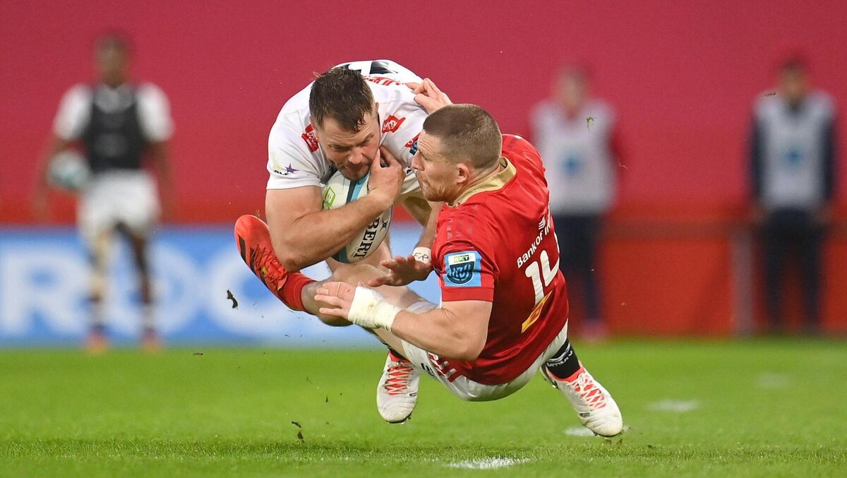 Marnus Potgieter is tackled by Andrew Conway during the United Rugby Championship match between Munster and Hollywoodbets Sharks at Thomond Park in Limerick. Picture: Seb Daly/Sportsfile