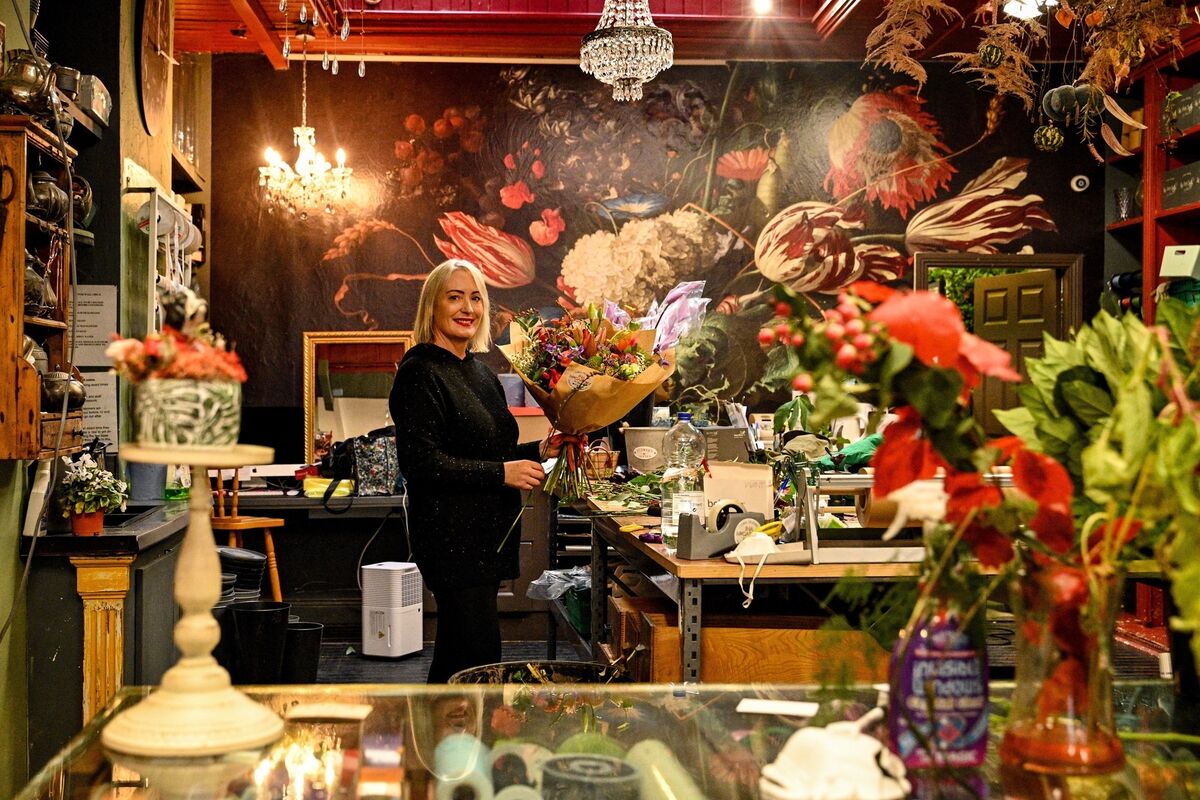 Staff at Ina McCarthy flowers smiling in the face of adversity. Despite continued flood warnings the community spirit in Midleton is keeping the town afloat. Picture: Chani Anderson