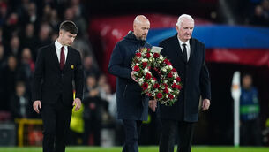 <p>TRIBUTE: Manchester United manager Erik ten Hag (centre) lays a wreath in tribute to Bobby Charlton prior to the Champions League Group A clash with Copenhagen at Old Trafford on Tuesday night. Picture: Nick Potts/PA Wire</p>