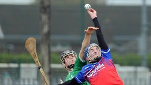 <p>Youghal's Conchúr Ó Gealbháin and St. Colman's College, Fermoy's Aodhán Hickey trying to win the ball. Pic: Denis Minihane.</p>
