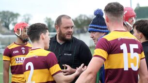 <p>CONTROVERSY: Rory Jacob and Arron O'Neill, De La Salle Waterford. questioning the Referee on the score. Pic: Brendan Gleeson</p>