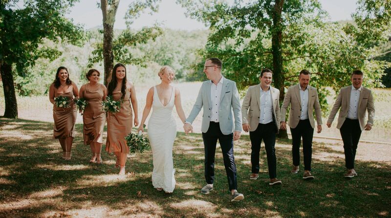 Jennifer Ryan and Dean Johnson with their wedding party. Pictures: Dylan Clifford Jennifer Ryan and Dean Johnson with their wedding party. Pictures: Dylan Clifford