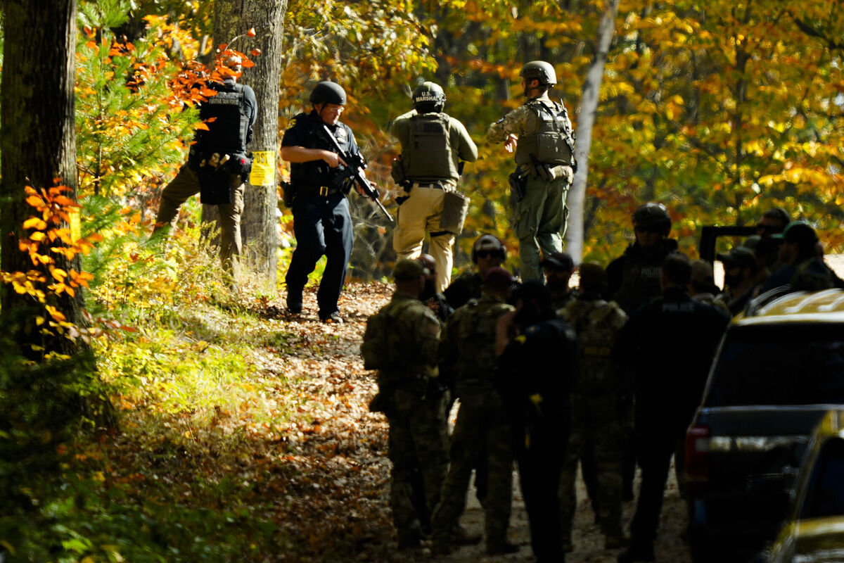 Law enforcement continue a manhunt in the aftermath of a mass shooting, in Durham, Maine, Picture: Matt Rourke