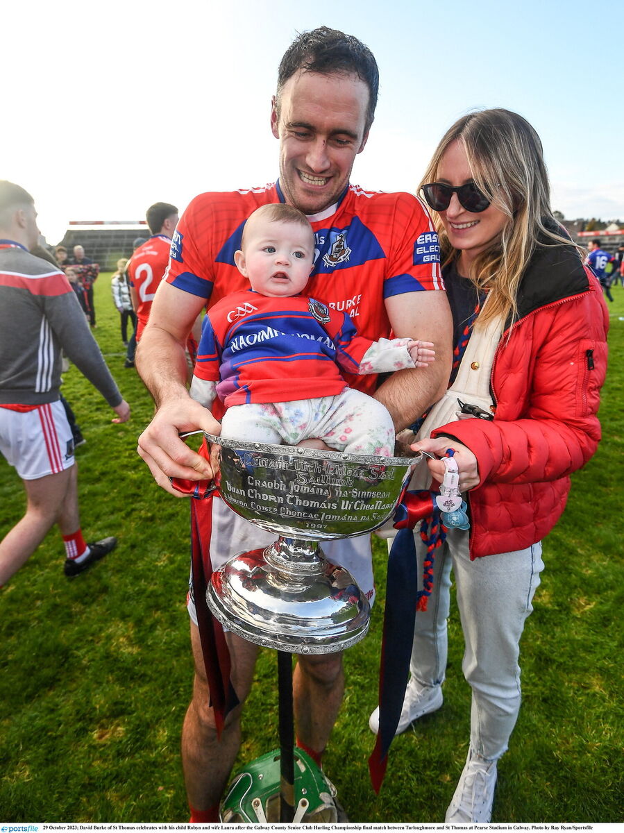 David Burke celebrates with his family and the cup.
