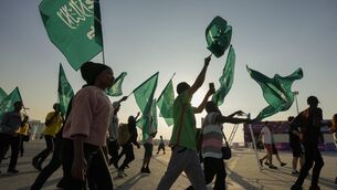 <p>WORLD CUP 2034: Fans of Saudi Arabia at the World Cup in 2022. (AP Photo/Andre Penner)</p>