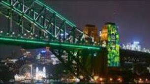 <p>The Sydney Harbour Bridge is lit in support of Australia's 2027 and 2029 Rugby World Cup bids. Photograph: Brett Hemmings/Getty Images for Rugby Australia</p>