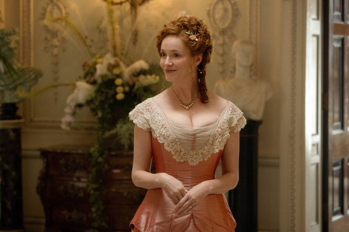 Christina Hendricks as Mrs St. George in The Buccaneers. Christina Hendricks as Mrs St. George in The Buccaneers.