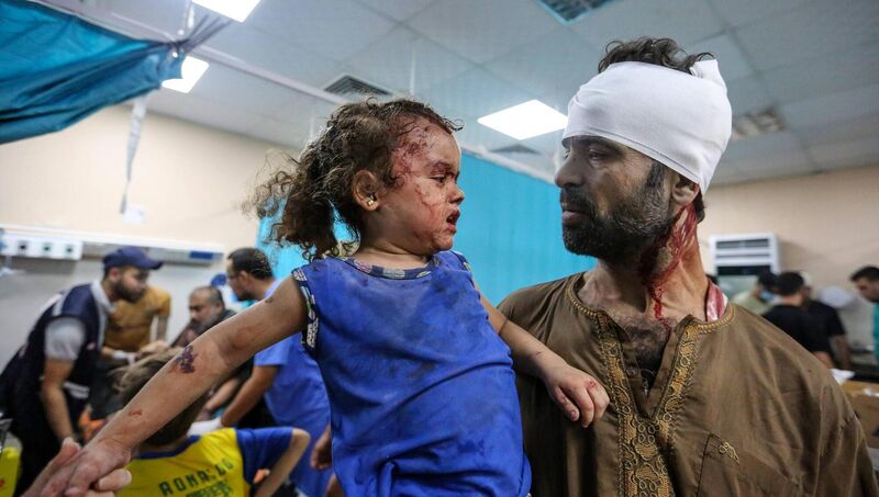 Palestinians injured in Israeli air raids arrive at  Nasser Hospital in Khan Yunis, Gaza, yesterday. Picture: Ahmad Hasaballah/Getty
