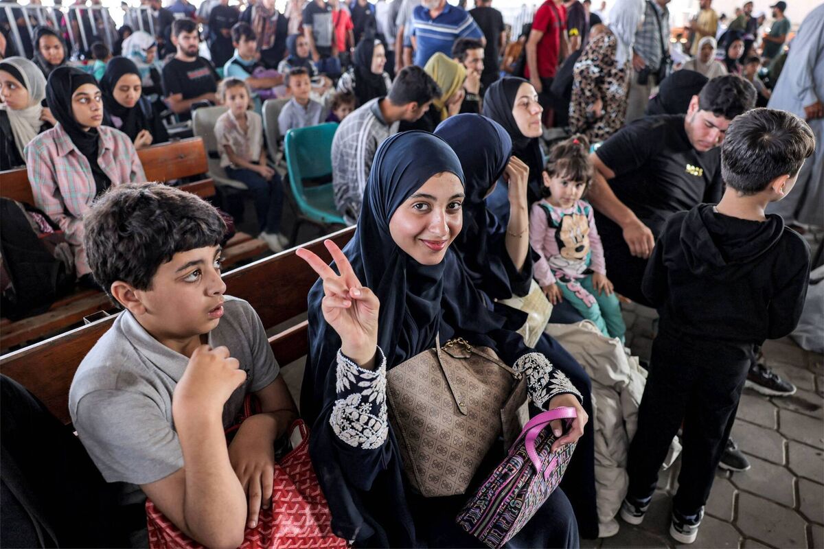 People sit in the waiting area at the Rafah border crossing in the southern Gaza Strip before crossing into Egypt on November 1, 2023. Picture: Mohammed Abed/AFP via Getty Images People sit in the waiting area at the Rafah border crossing in the southern Gaza Strip before crossing into Egypt on November 1, 2023. Picture: Mohammed Abed/AFP via Getty Images