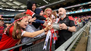 <p>QUITE THE JOURNEY: Former Cork manager Matthew Twomey carries the Sean O'Duffy Cup. Pic: ©INPHO/Ben Brady</p>