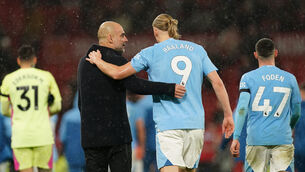 <p>PEP TALK: Manchester City manager Pep Guardiola speaks with Erling Haaland following the Premier League match at Old Trafford. Photo credit: Martin Rickett/PA Wire.</p>
