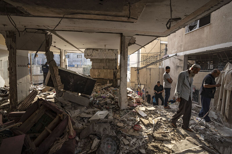 Palestinians look at the destruction after Israeli strikes on the Gaza Strip in Khan Younis. Picture: AP Photo/Fatima Shbair Palestinians look at the destruction after Israeli strikes on the Gaza Strip in Khan Younis. Picture: AP Photo/Fatima Shbair