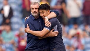 <p>Ange Postecoglou with Tottenham captain Son Heung-min (Nick Potts/PA)</p>