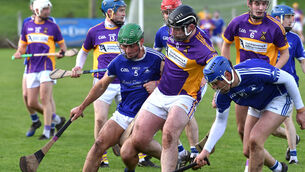 <p> Rory Galvin, St Catherine's getting between Ardmore players Jack Keane and John O'Brien in their AIB Munster GAA Club Junior Hurling Championship quarter-final match at Fraher Field, Dungarvan, Co Waterford. Picture Dan Linehan</p>