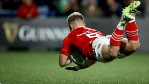 <p>DRAGONS TAMED: Munster's Craig Casey scores his team's fifth try. Pic Credit ©INPHO/Ben Brady</p>
