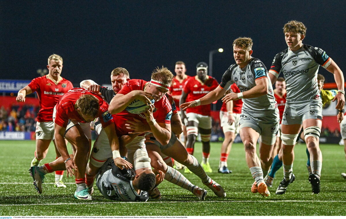 Gavin Coombes of Munster dives over to score his side's second try despite the tackle of Will Reed of Dragons during the United Rugby Championship match between Munster and Dragons at Musgrave Park in Cork. Photo by Eóin Noonan/Sportsfile Gavin Coombes of Munster dives over to score his side's second try despite the tackle of Will Reed of Dragons during the United Rugby Championship match between Munster and Dragons at Musgrave Park in Cork. Photo by Eóin Noonan/Sportsfile