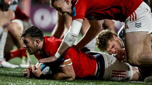 <p>STRENGTH AND DEPTH: Munster's Tom Ahern scores his teams fourth try. Pic Credit ©INPHO/Ben Brady</p>
