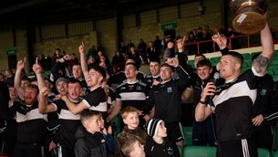 <p>Newcastle West joint-captain Iain Corbett lifts the cup after the Limerick County Senior Club Football Championship final match between Adare and Newcastle West at TUS Gaelic Grounds in Limerick. Photo by Tom Beary/Sportsfile</p>