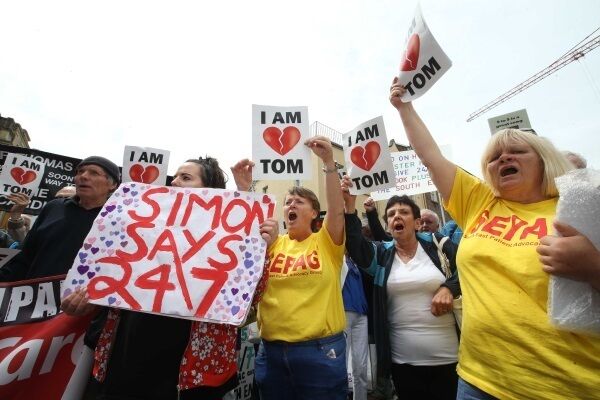 Protesters make sure their voices are heard outside Leinster House.