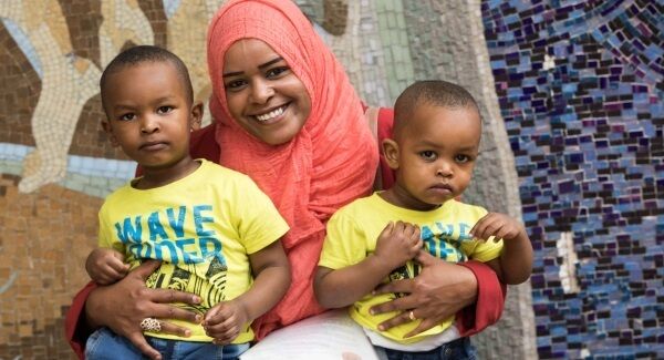 Hannaa Ahmed, originally from Sudan and now living on Upper Yellow Rd, Waterford, with Adel and Rade at the ceremony.