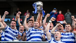 <p>10 YEARS ON: Castlehaven captain Mark Collins and teammates celebrate with the Andy Scannell Cup. Pic: Brendan Moran/Sportsfile</p>