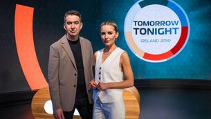 <p>Mark Little and Carla O’Brien front Tomorrow Tonight, an imaginary news broadcast set 25 years in the future</p>
