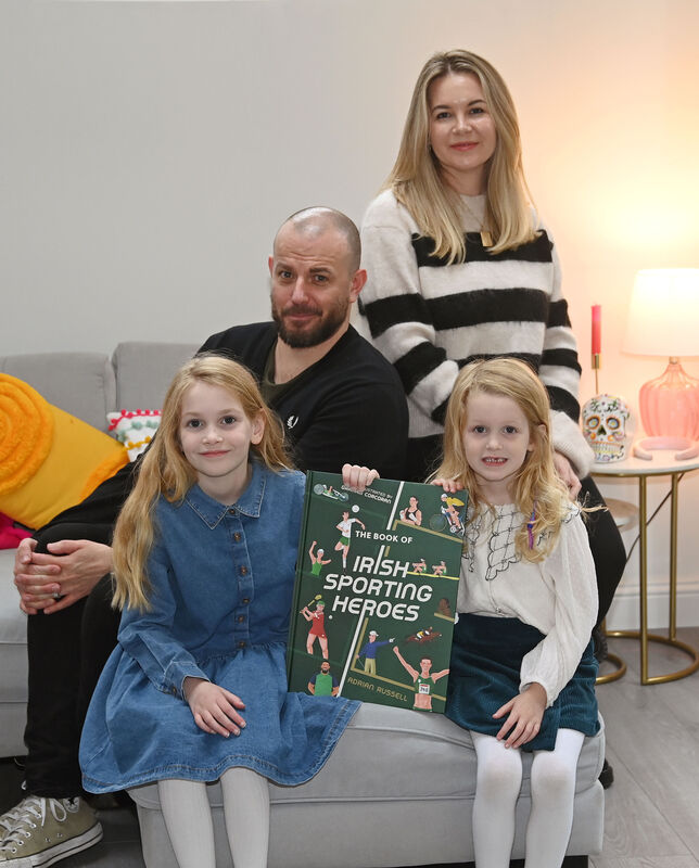 Author Adrian Russell with his wife Sara and their daughters Robin and Ruby in Cork.