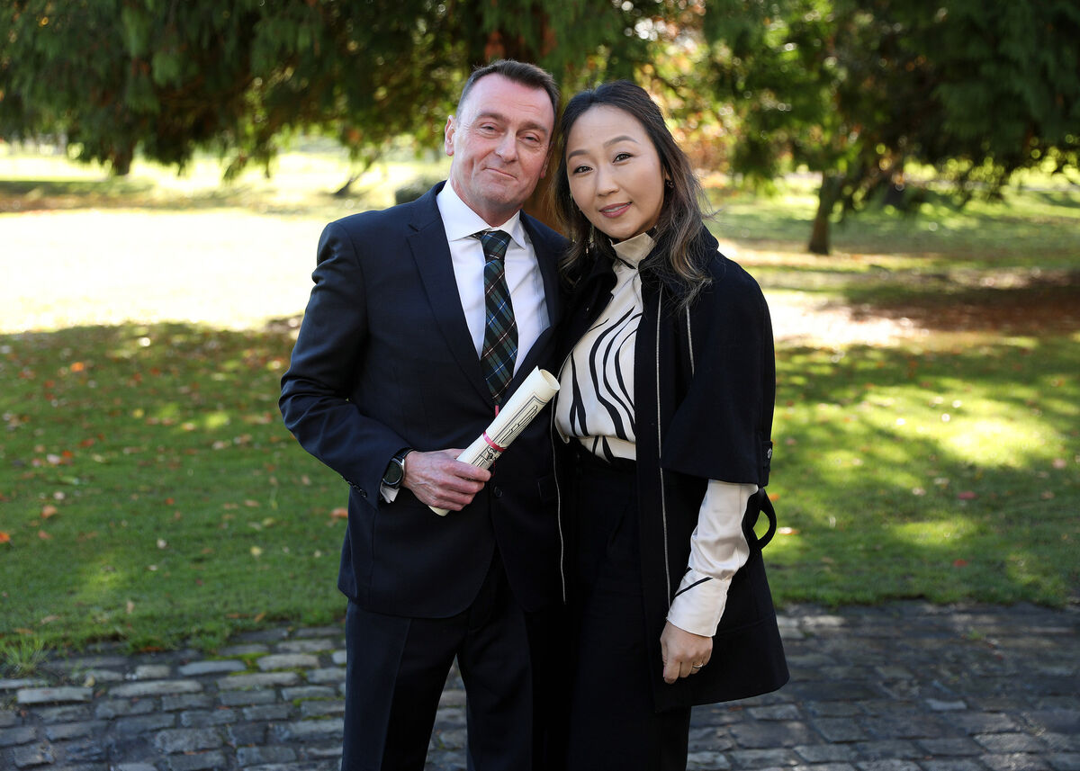 Eric Doran with his wife Ganzul Tumenajargul: Mr Doran was awarded for his bravery in stopping the abduction of a woman in Dublin in January 2020.