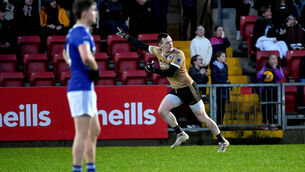 <p>OVER: Scotstown goalkeeper Rory Beggan celebrates after he scored the winning point from a free.</p>