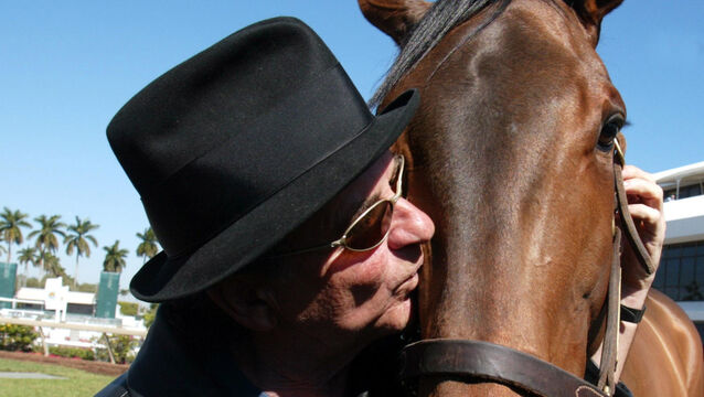<p class="contextmenu internal_Caption">GOOD FETLOCKS: Actor Joe Pesci pecks his beloved steed and namesake.</p>