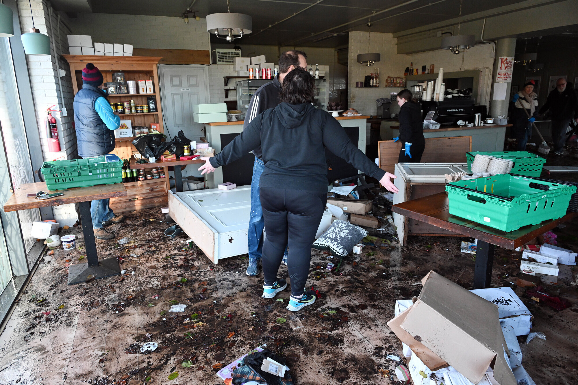 Helping out to clear up the damage caused to Poppy Seed cafe in Clarinbridge after Storm Debi. Picture: Ray Ryan