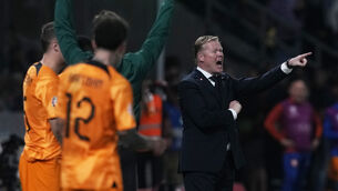 <p>GET THE JOB DONE: Netherlands' coach Ronald Koeman instructs his players during the Euro 2024 group B qualifying soccer match between Greece and The Netherlands. Pic: AP Photo/Thanassis Stavrakis</p>