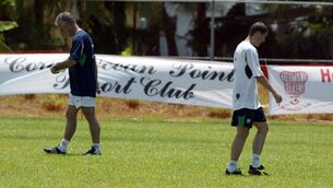 <p>World Cup 2002 Republic of Ireland 21/5/2002 Manager Mick McCarthy and Roy Keane pass each other during training Mandatory Credit ¬©INPHO/Andrew Paton</p>