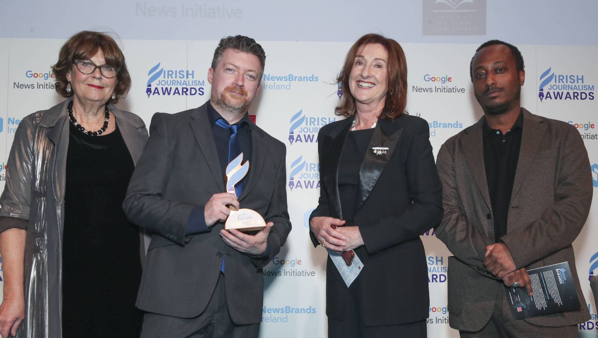 The Examiner's David O’Mahony receiving the award from Claire Grady, Press Ombudsman Susan McKay, and Joel Tecleab, strategic partnerships UK/IE at Google. Picture: Fennell Photography