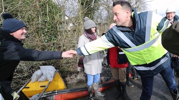 Taoiseach Leo Varadkar shakes hands with members of the public as he visits flood prevention measures in Athlone, Co. Westmeath. Pic: PA
