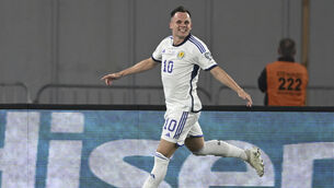 <p>Lawrence Shankland celebrates Scotland’s late equaliser. Pic: Tamuna Kulumbegashvili/AP.</p>