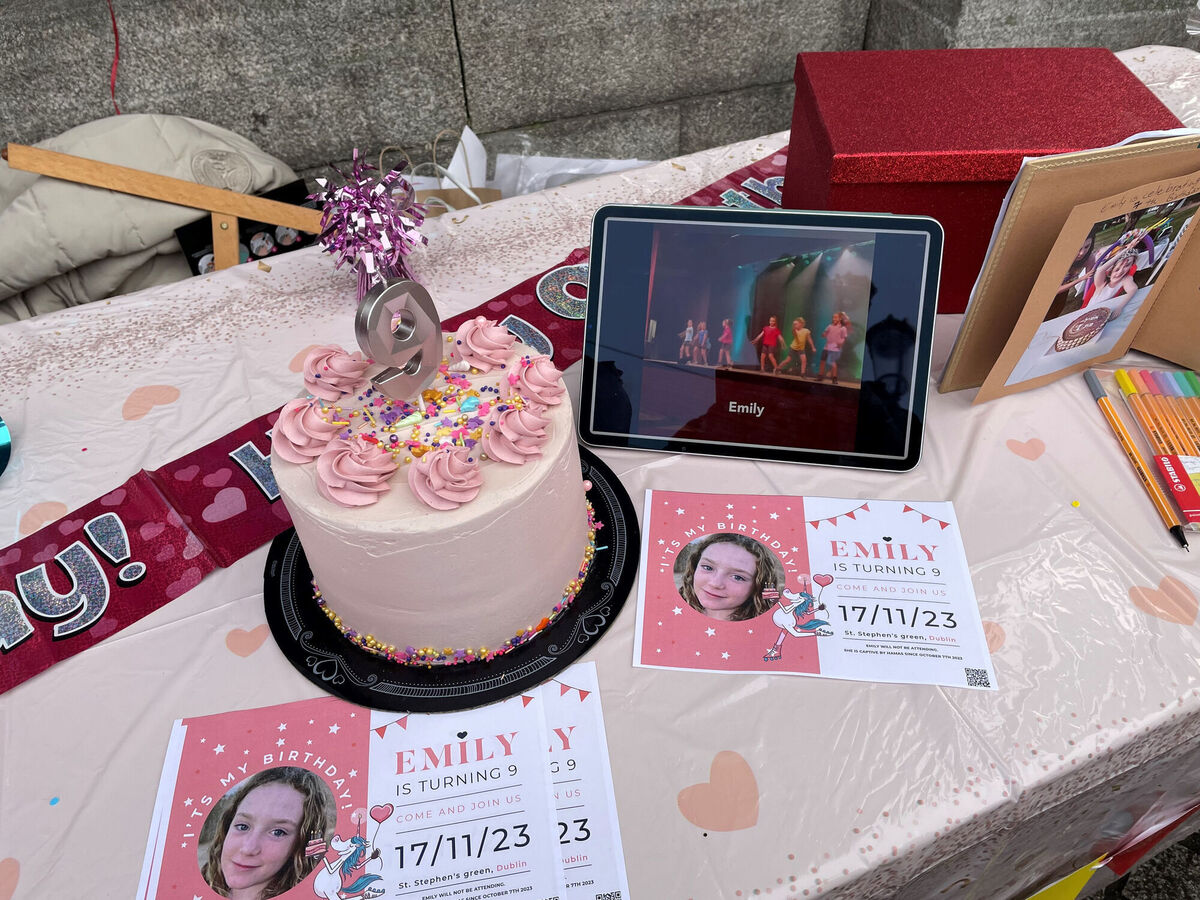 A birthday spread on a table at the entrance to St Stephen's Green for Irish-Israeli girl Emily Hand. Picture: David Young/PA Wire