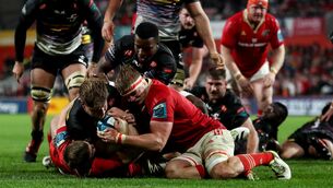<p>DEFENSIVE STEEL: DHL Stormers' Evan Roos is held up over the line by Jack Crowley and Gavin Coombes of Munster. Pic: ©INPHO/Ben Brady</p>