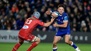 <p>STELLAR RETURN: Hugo Keenan of Leinster eludes Scarlets' Jonathan Davies</p>
