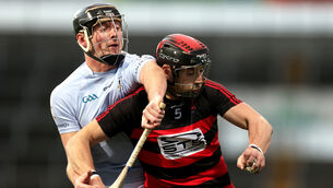 <p>Ballygunner's Shane O'Sullivan and Conor Boylan of Na Piarsaigh</p>